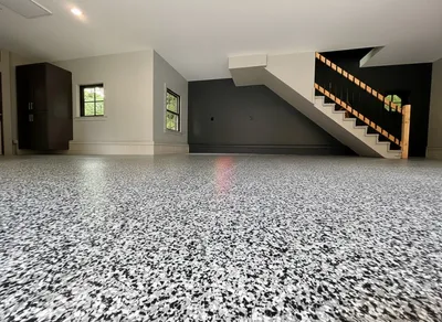 Basement epoxy floor coating in a Central NJ home, moisture-resistant finish for rec rooms and home gyms
