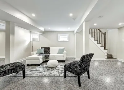 Basement epoxy floor coating in a Central NJ home, moisture-resistant finish for rec rooms and home gyms