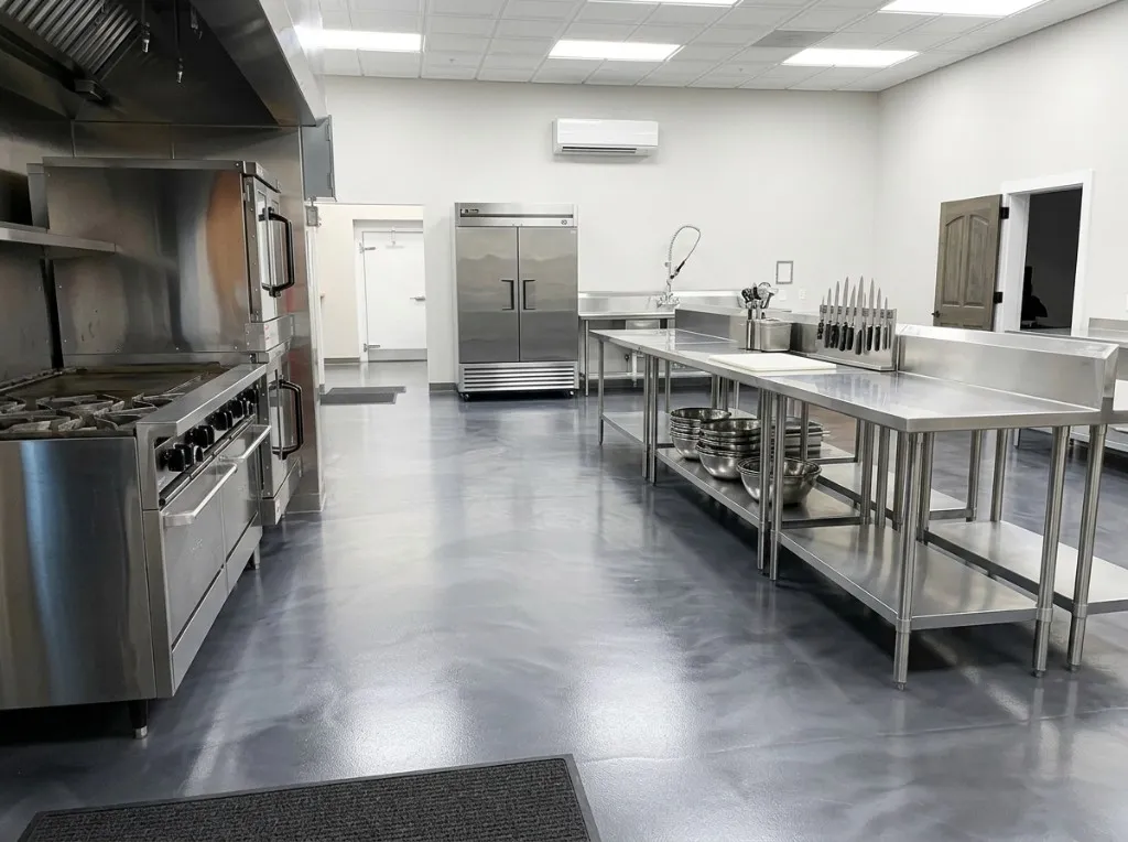 Metallic epoxy floor in a commercial kitchen, ready for a free coating estimate