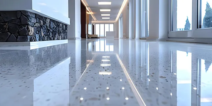 High-gloss polished epoxy floor in a modern commercial lobby